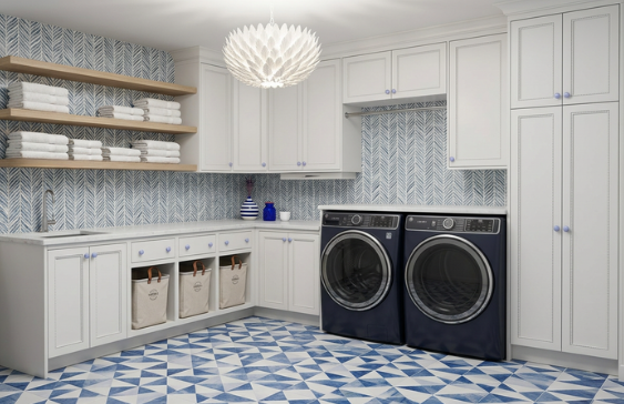 Blue and white patterned laundry room with custom cabinetry